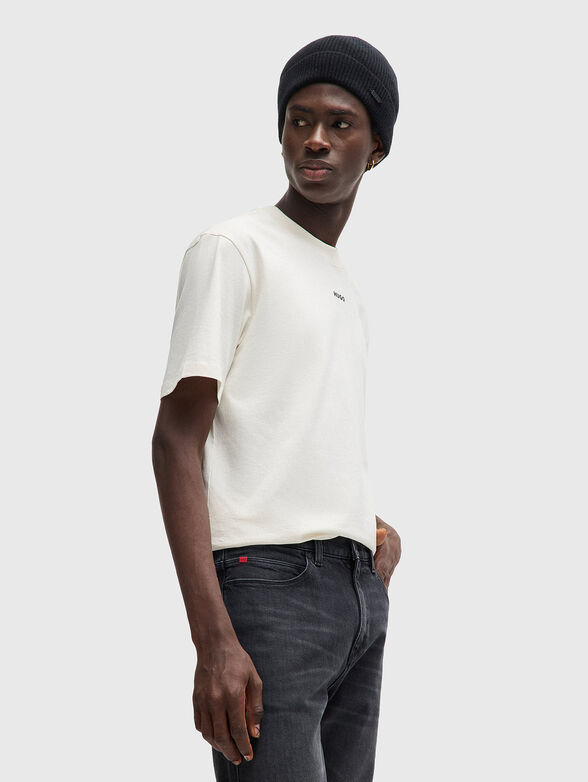 Jeans with washed effect and logo - 3