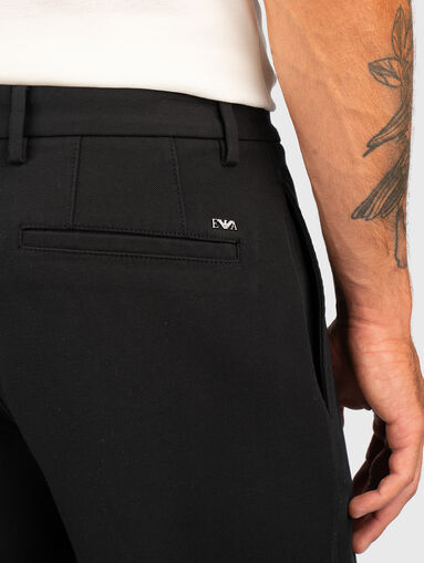 Trousers with pockets and logo detail - 3