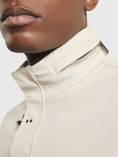 Transitional jacket with accent fastening - 4