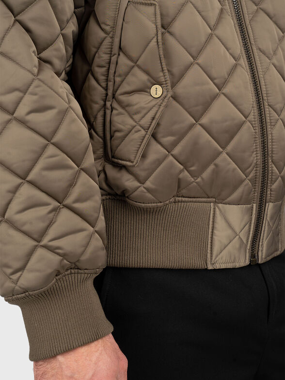 Quilted jacket with side pockets - 6