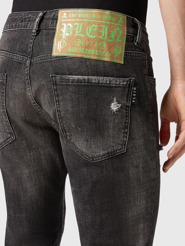 Blue jeans with washed effect and accent rips - 3