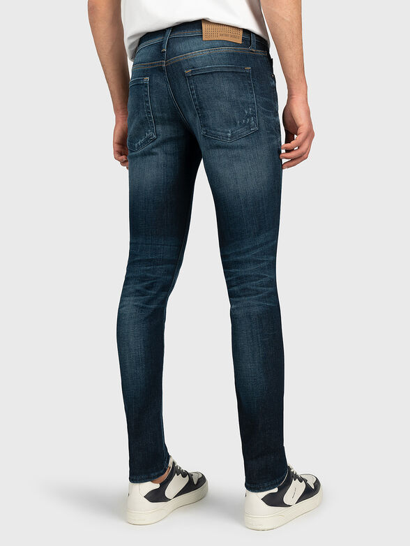 Skinny jeans with abrasions - 3