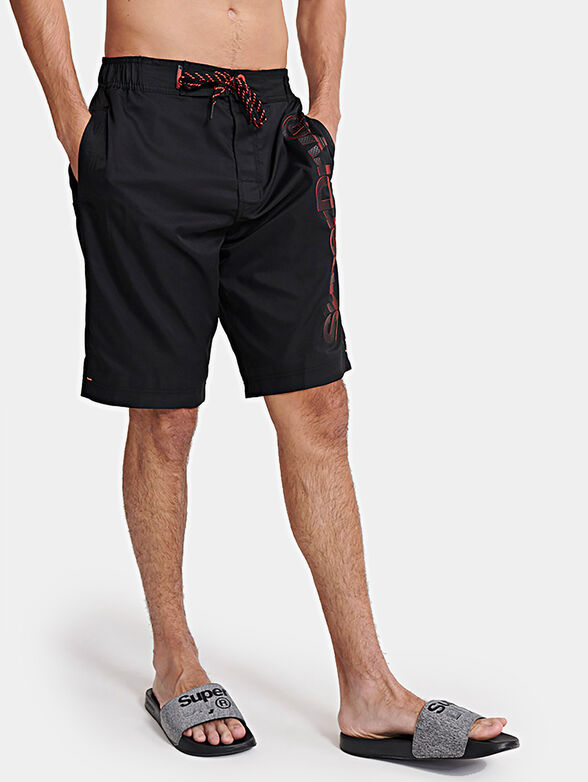 Black beach shorts - 1