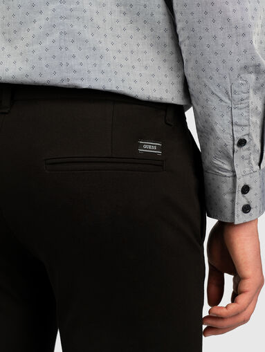 MYRON Slim trousers in black color - 5