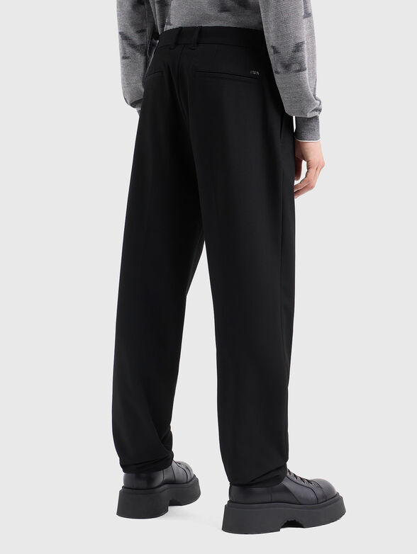 Straight trousers in black - 1