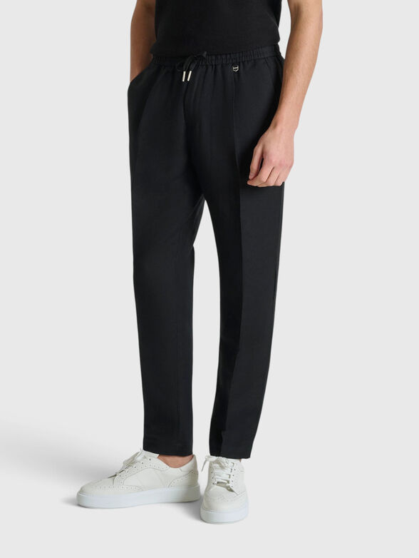 Trousers with a mini logo detail - 1