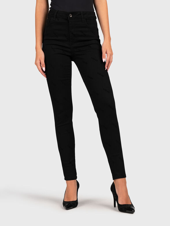 High-waisted black jeans - 1