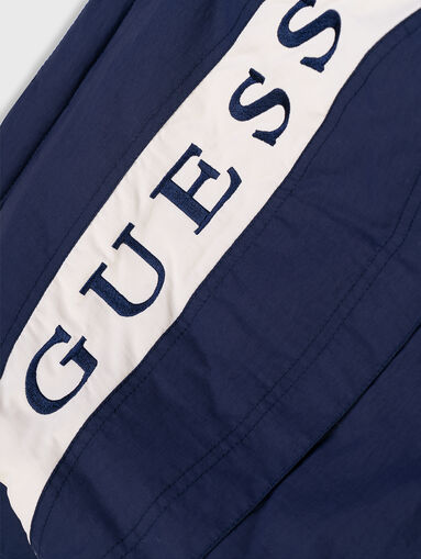 Dark blue jacket with logo on the back - 3