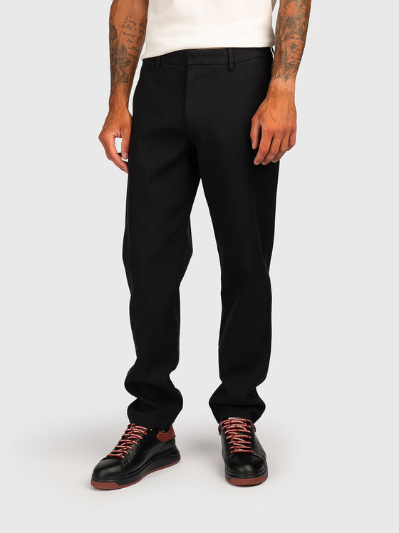 Trousers with pockets and logo detail - 1