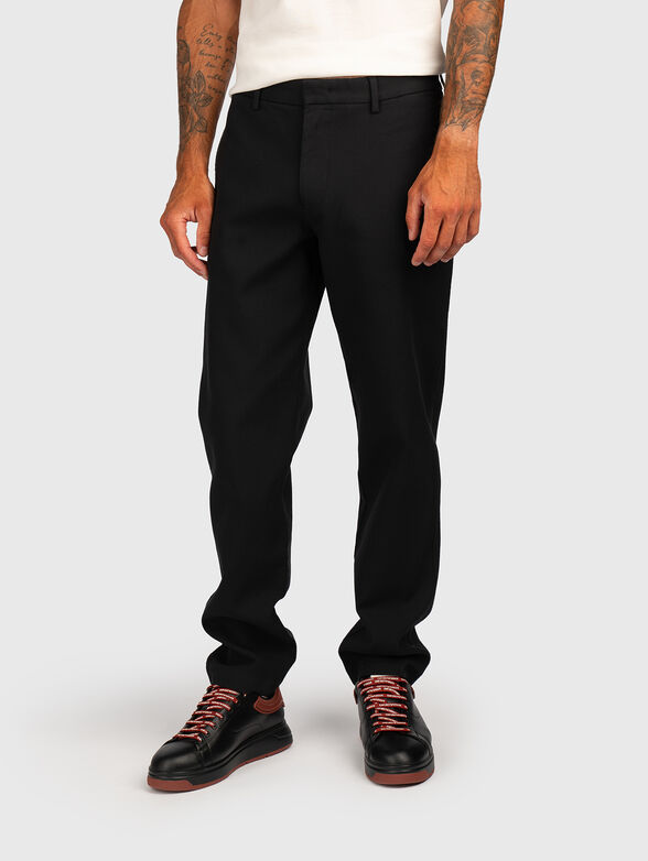 Trousers with pockets and logo detail - 1