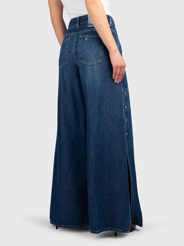 Flared jeans with side slits - 2