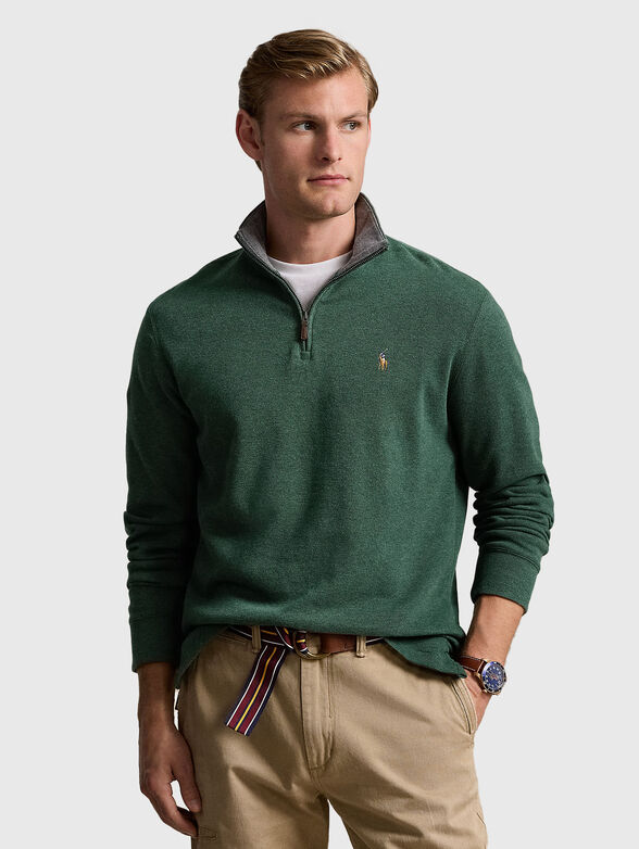 Green sweater with a zipper on the collar - 1