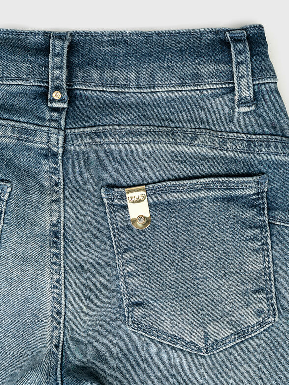 Jeans with rhinestone logo - 4