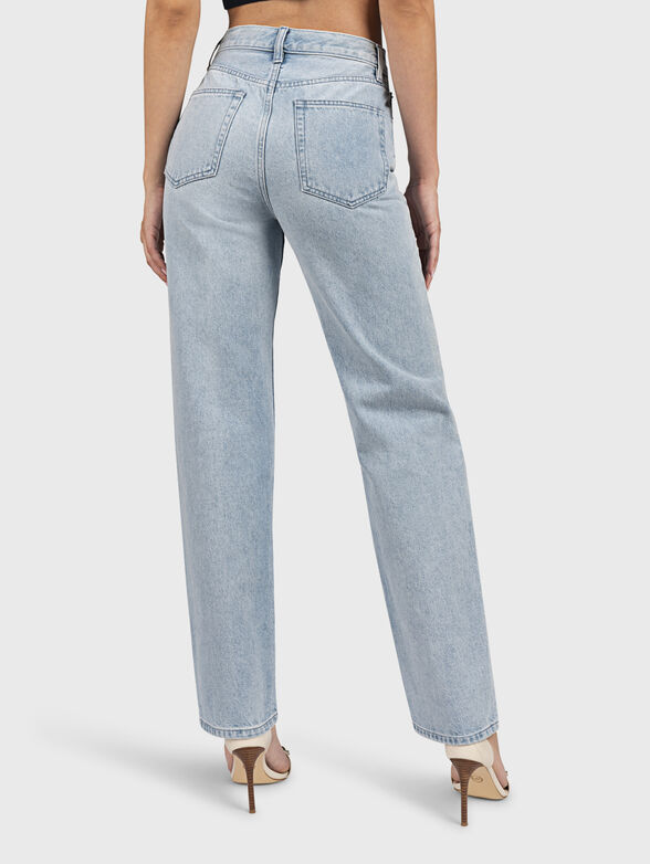 Light blue jeans with asymmetric fastening - 2