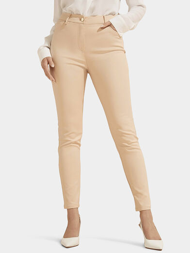 Skinny pants in beige color - 1