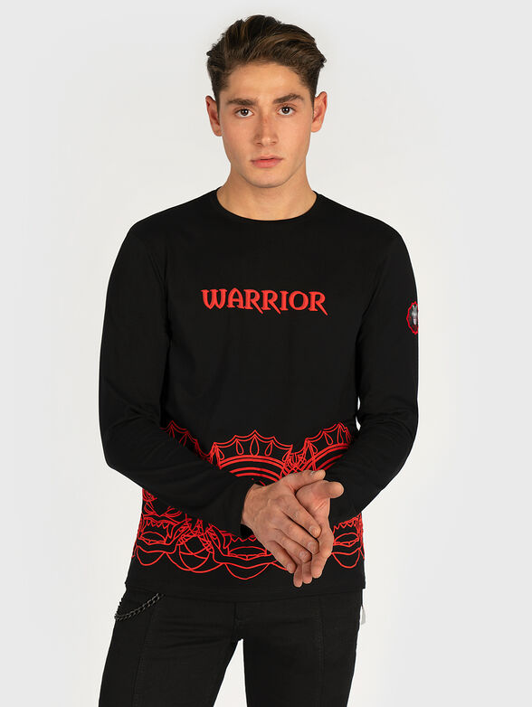 Black blouse with contrasting print - 1