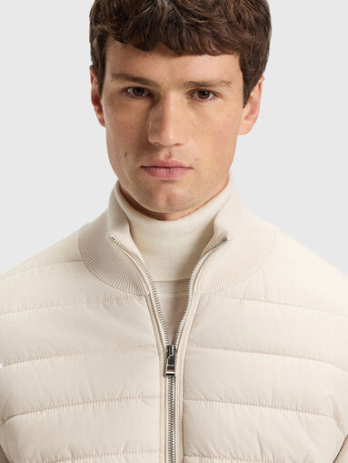 Padded jacket with knitted sleeves - 4