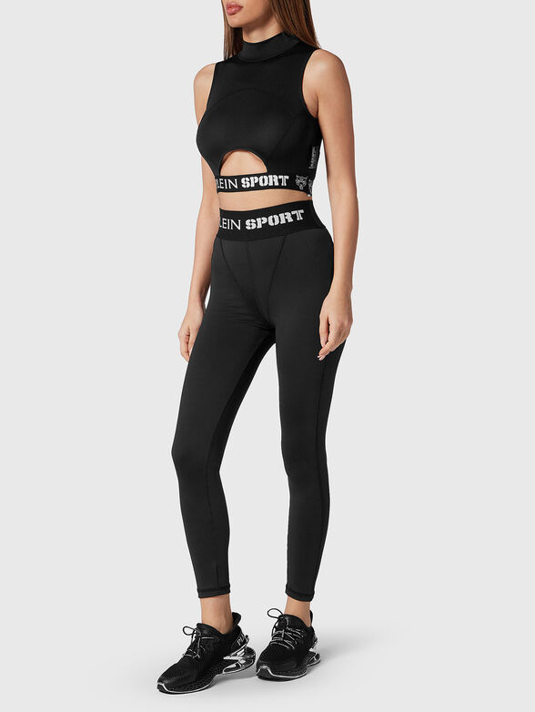 Sports top in black with cut out accent  - 2