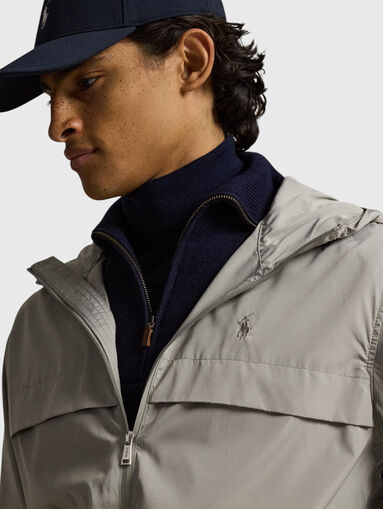 Hooded jacket with a double zip - 4