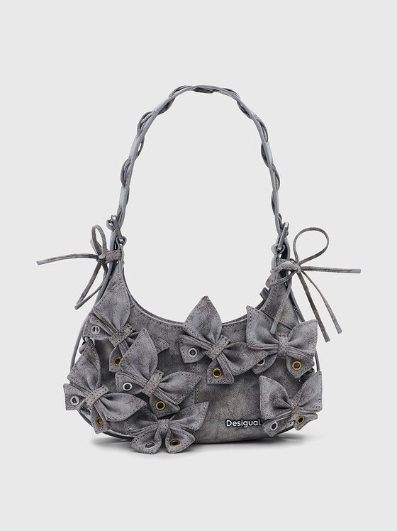 Малка чанта с капси и избелен ефект - 1