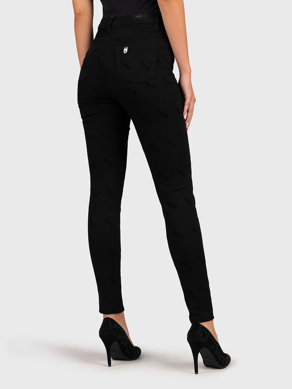 High-waisted black jeans - 2
