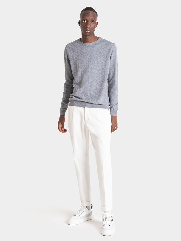 Blue sweater with art details - 4