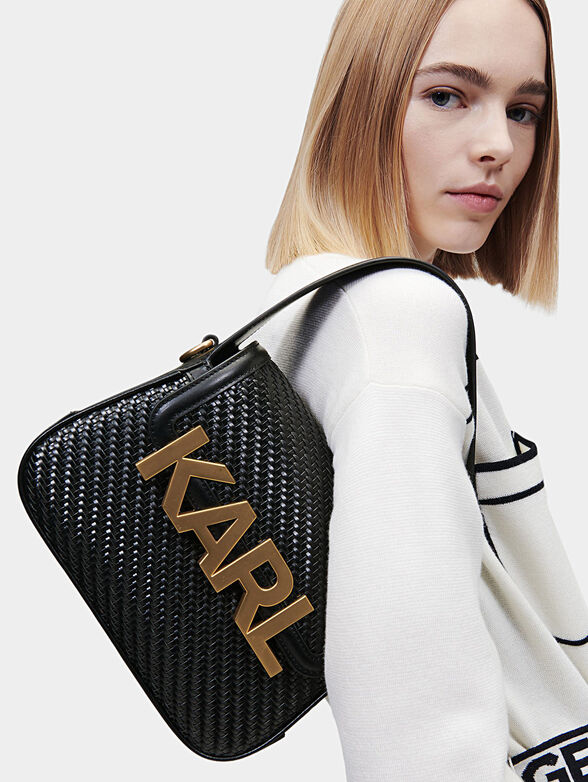 Black crossbody bag with logo accent - 2