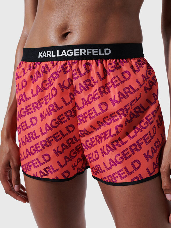 VARSITY sports shorts with logo print - 1