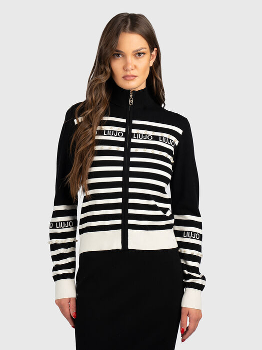 Vest with zip and logo accents