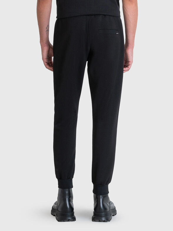 Sports trousers with accent stitching - 1