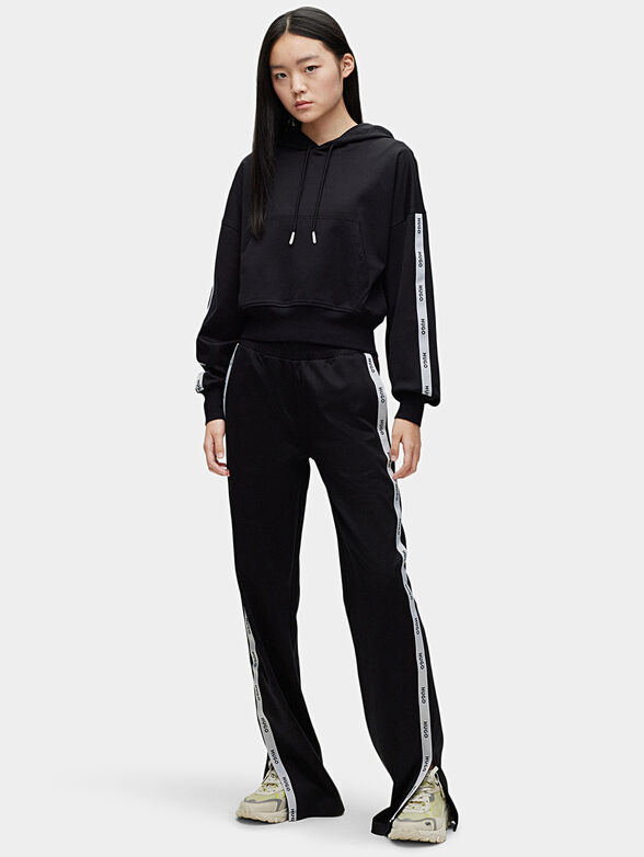 Sports pants with contrasting stripes - 4