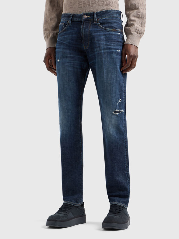 Jeans with washed effect and accent rips - 0