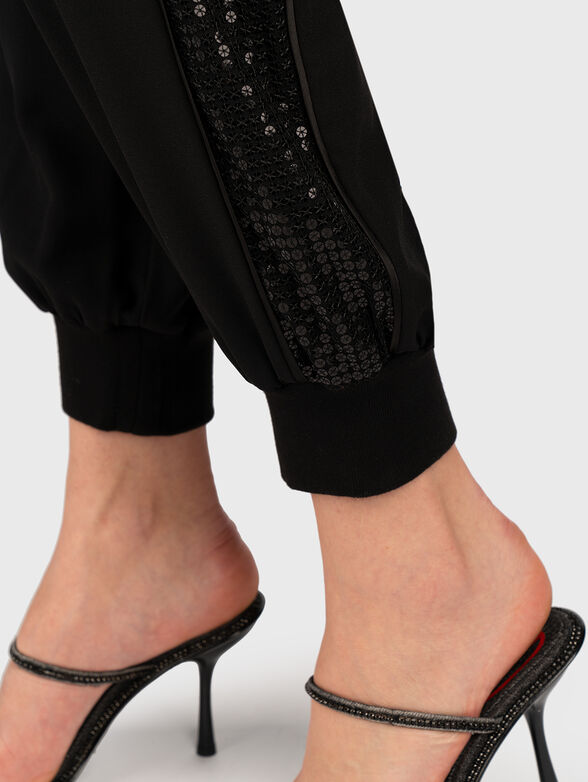 Sports trousers with sequins and logo - 5