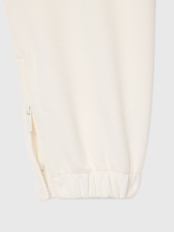Sports trousers with zip at the legs - 4