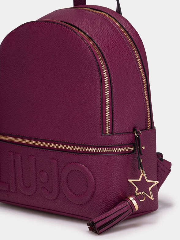 Backpack with embossed logo and pendant - 4