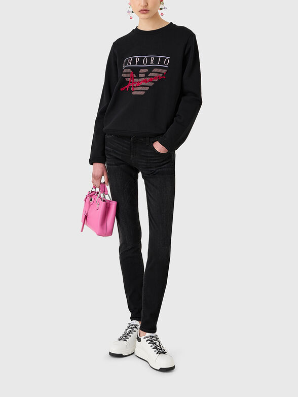 Black jeans with embroidered logo - 6