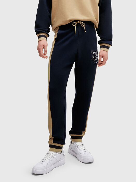Sports pants with logo patch
