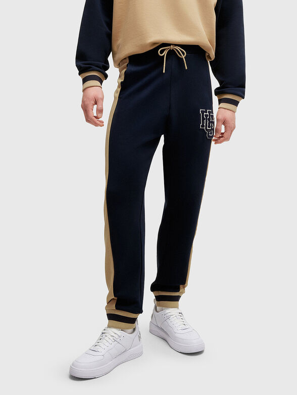 Sports pants with logo patch - 1