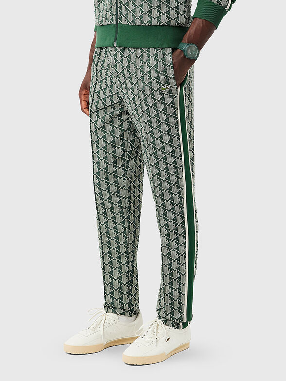 Brown sports trouser with monogram print - 1