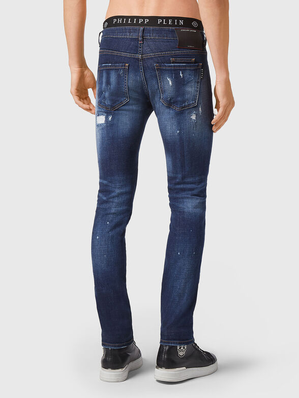 Jeans with washed effect and rips - 2