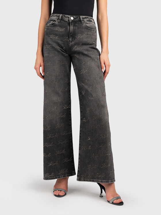 Jeans with monogram of appliqued rhinestones - 1