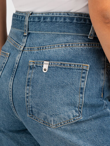 Jeans with washed effect and belt - 3