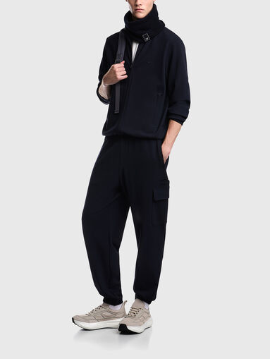Dark blue trousers with a textured pattern - 5