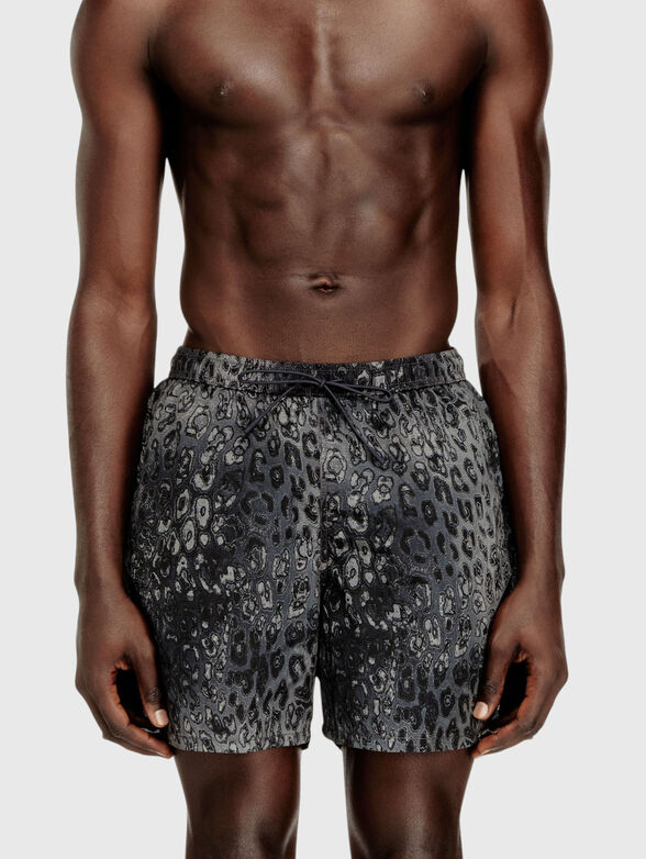 Beach shorts with animal print - 1