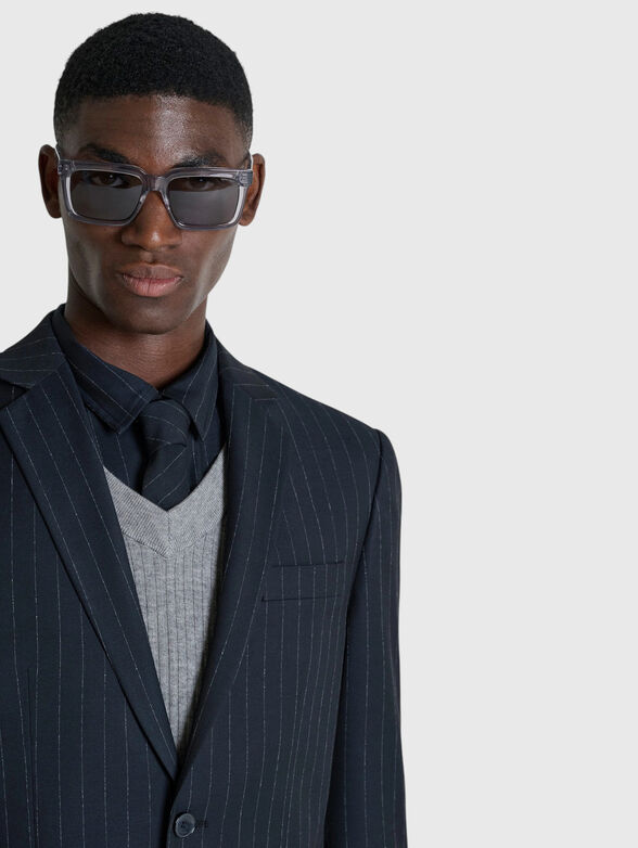 Striped jacket with a single-breasted closure - 4