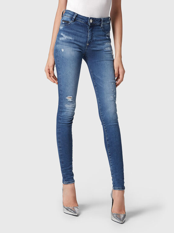 Skinny blue jeans with ripped details - 1