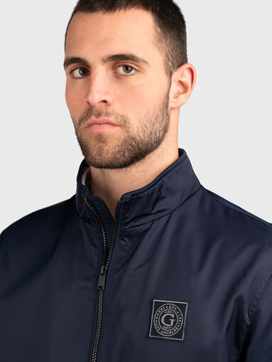 Blue jacket with zip and logo patch - 5