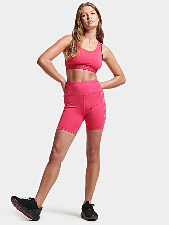 Pink sports bra with logo accents - 2
