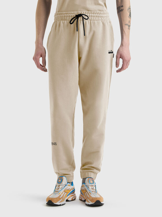 LEGACY unisex sports trousers in beige - 1