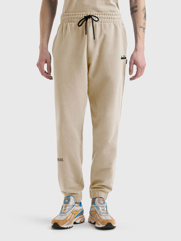 LEGACY unisex sports trousers in beige - 1